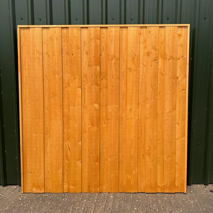 Golden-brown-treated-fence-panels-timberulove-1.jpeg