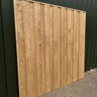 Oak-colour-tretaed-fence-panels-timberulove-1.jpeg