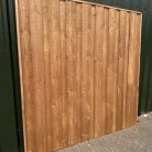 Treated-Brown-fence-panels-timberulove-1.jpeg
