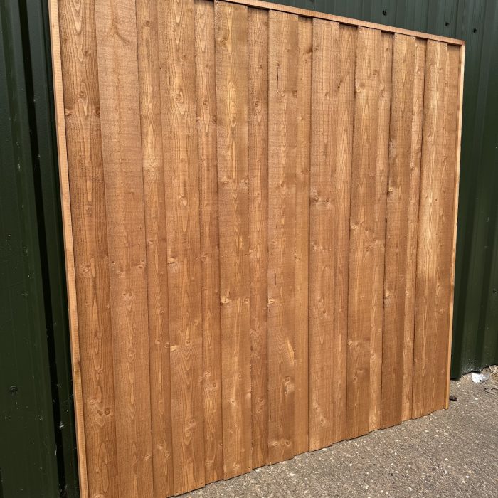 Treated-Brown-fence-panels-timberulove-1.jpeg