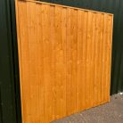 Treated-Golden-browm-fence-panels-timberulove-1.jpeg