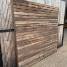 Treated-Privacy-Fence-panels-Dark-Brown-Timberulove-scaled-2.jpeg