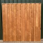 Treated-brown-fence-panel-timberulove-1.jpeg