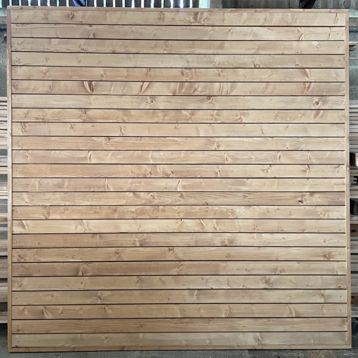 Treated-fence-panles-oak-colour-timberulove-1.jpeg